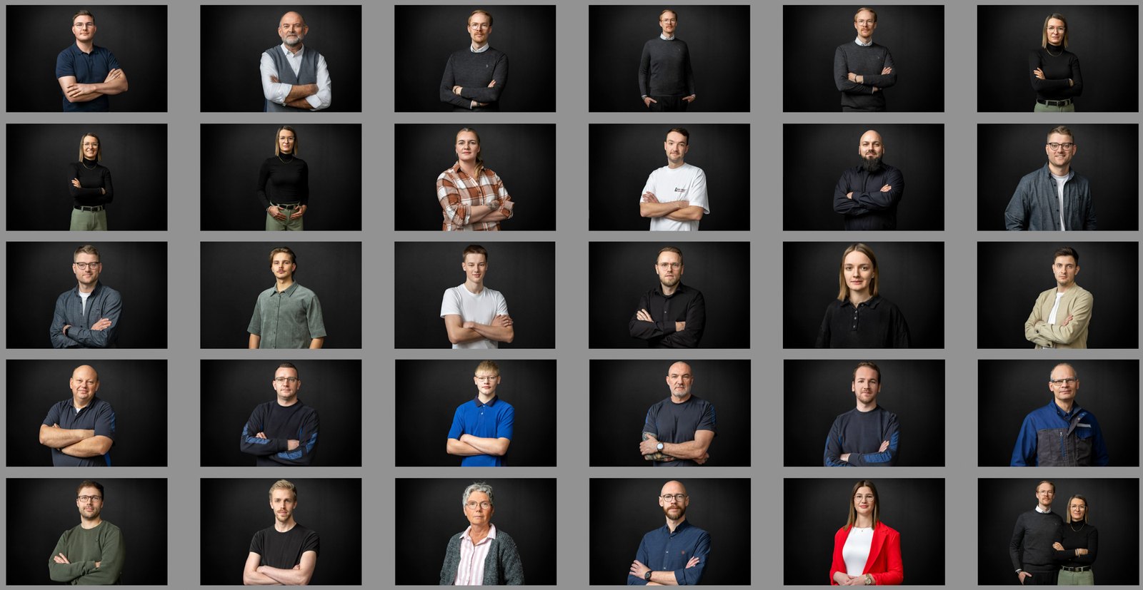 Mitarbeiterportraits für Lenkering in Steinfeld vor schwarzer Wand, Übersicht des Teams